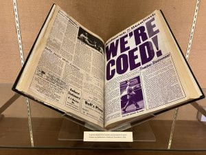 An edition of the Student with the headline "We're Coed!" printed large and in purple